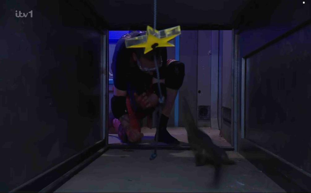 Aitch completing the bush tucker trial The Jungle Doomsday Vault.