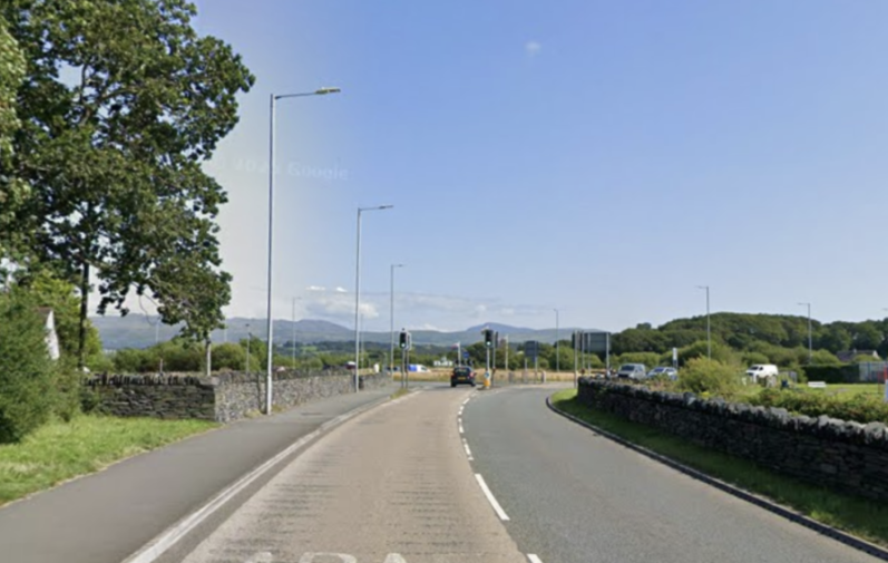 The A487 road near the Porthmadog bypass, with mountains in the background.
