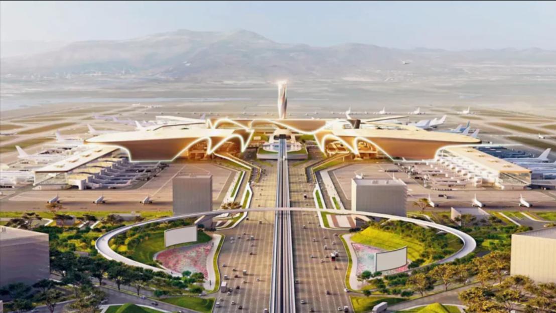 Illustration of an aerial view of a futuristic airport with multiple terminals, many airplanes parked, a central control tower, and a highway leading to it.