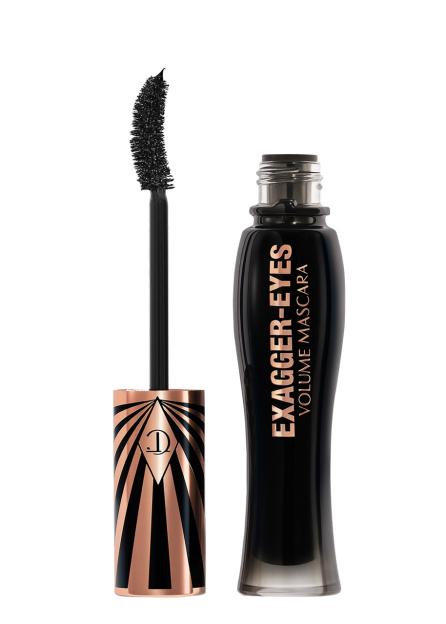 Exagger-Eyes Volume Mascara with its applicator beside the open bottle.