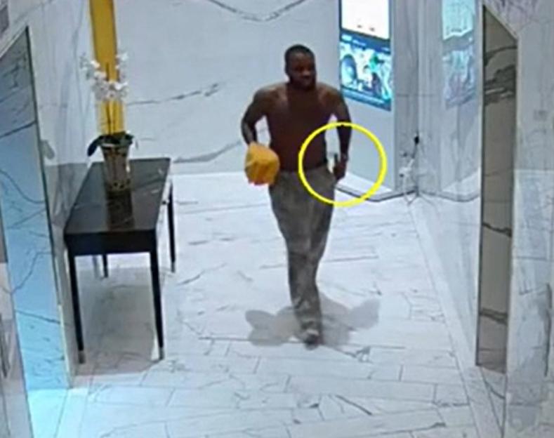 CCTV footage of Fawaz Abdul Kareem leaving his flat with a knife in the waistband of his trousers.