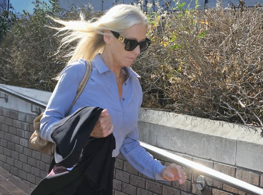 Sally-Anne Bowen walking outdoors.