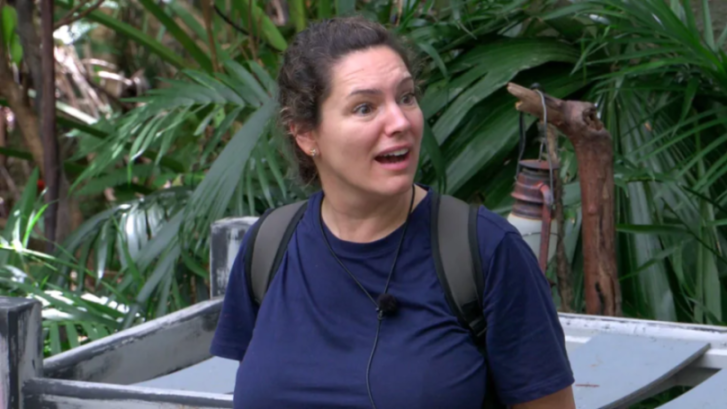 Antonia "Toni" Dalli with an open mouth expression, speaking.