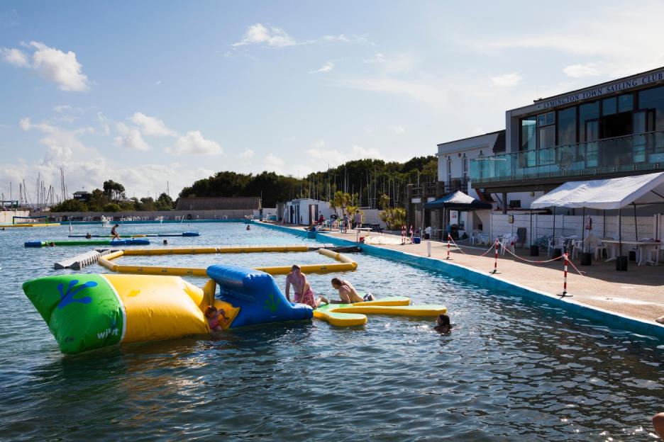 Step Back in Time at Britain’s Oldest Seawater Lido: Dive into a 1950s Experience with an Inflatable Obstacle Course and 7m Climbing Tower!