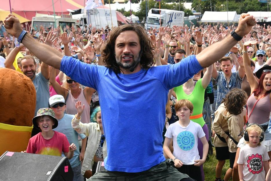 Joe Wicks conducting a morning workout at the Gateway stage during day two of Glastonbury festival 2025.