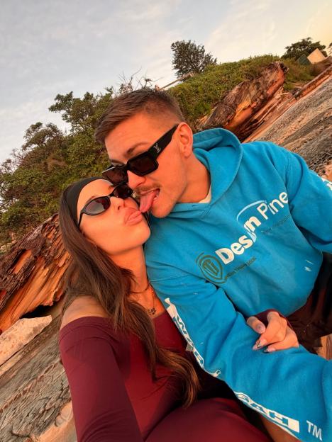 Yana Marks and Kye Lambert posing closely, with Kye sticking his tongue out.