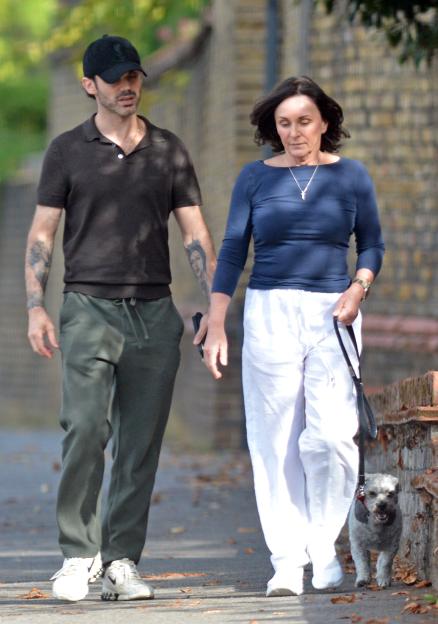 Shirley Ballas, 66, steps out with new man, 36, as pair snuggle on loved-up dog walk