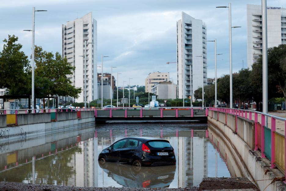 Heavy rain floods streets after local authorities issued a weather alert in Valencia