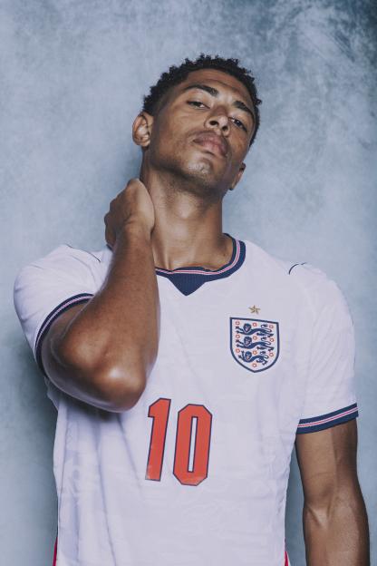 Jude Bellingham in an England football jersey with the number 10, posing for a portrait.
