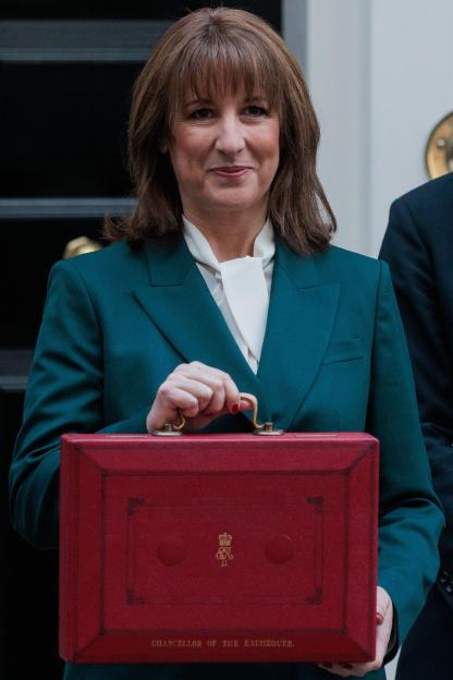 Rachel Reeves, UK Chancellor of the Exchequer, leaves 11 Downing Street with the budget despatch box.