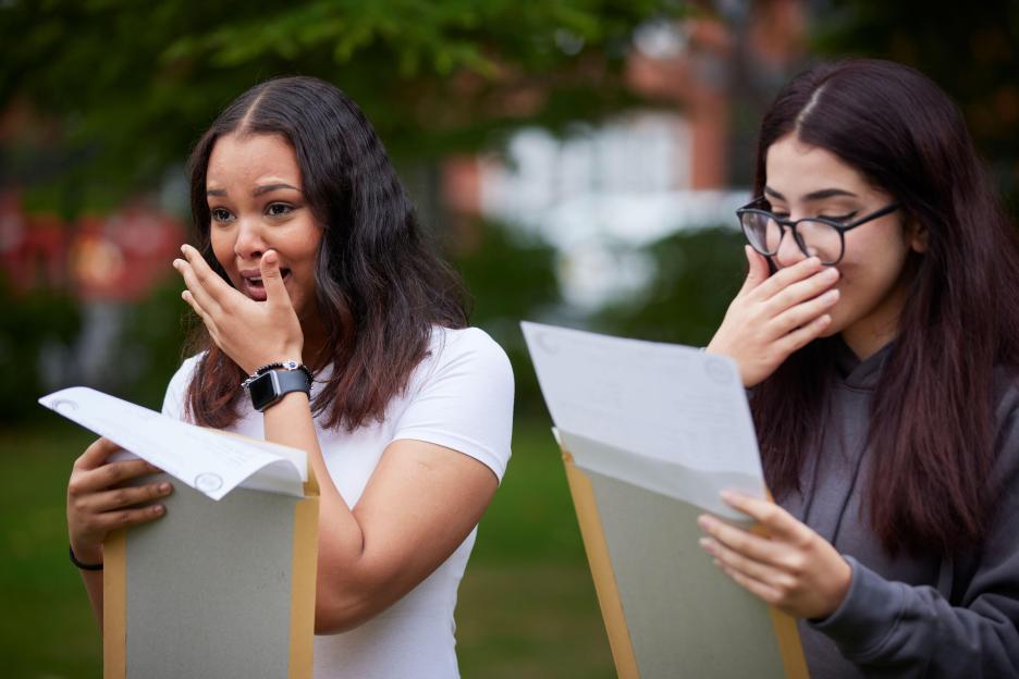 2022 A Level results day at in South Manchester..Celebrating their results success at Whalley Range High School.