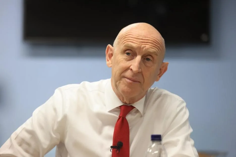 Chancellor of the Exchequer John Healey speaking during a visit to St Martin-in-the-fields homeless charity.