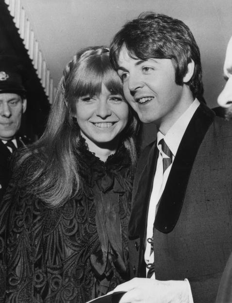 Paul McCartney and Jane Asher smiling together at a film premiere.