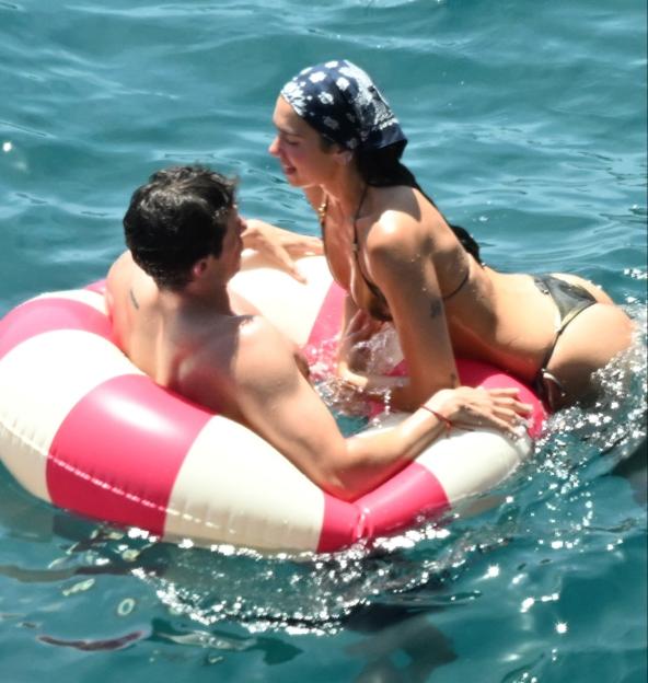 *PREMIUM-EXCLUSIVE* MUST CALL FOR PRICING BEFORE USAGE - Newlyweds Dua Lipa and Callum Turner looked every inch the loved-up couple as they soaked up the sunshine on the stunning Amalfi Coast during their romantic Italian honeymoon.