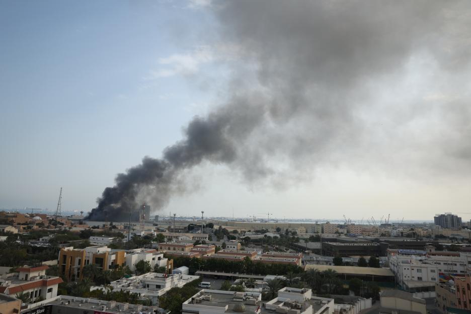Black smoke rises from a missile strike over the city of Manama, Bahrain.
