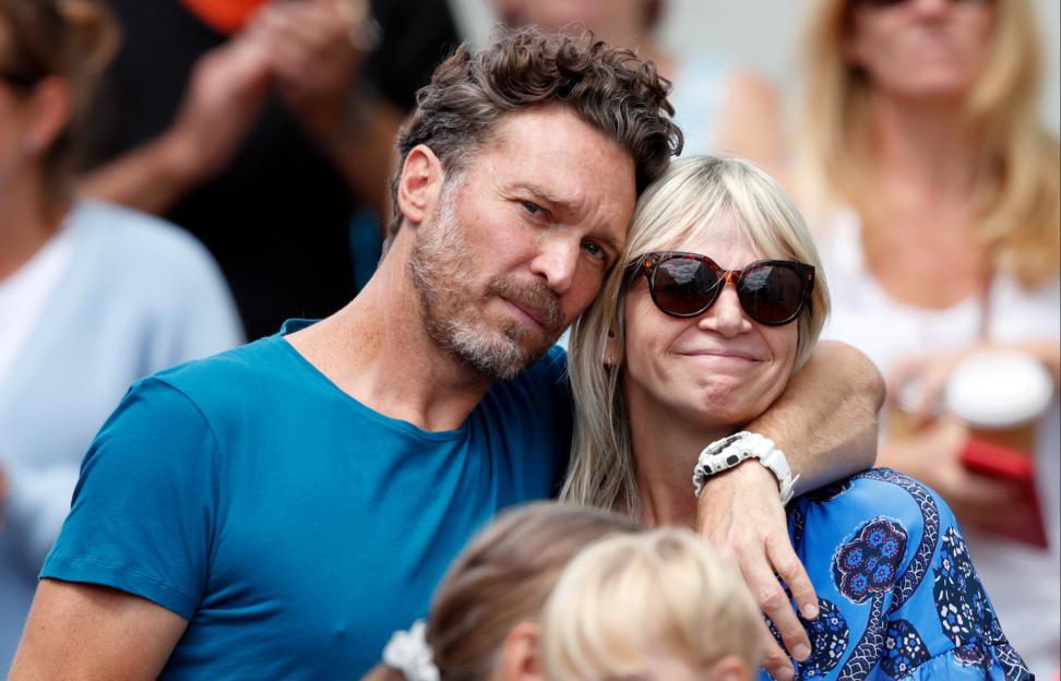 Zoe Ball and Michael Reed watching Dame Vera Lynn's funeral cortege.