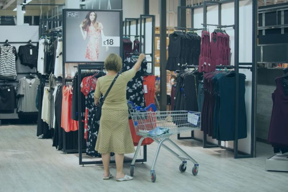 An image collage containing 1 images, Image 1 shows Woman shopping for clothes in Tesco's F&F clothing section, Watford store