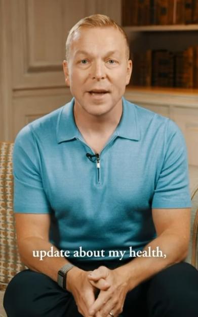 Sir Chris Hoy sitting and giving a health update.