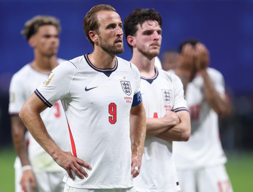 England players Harry Kane and Declan Rice looking dejected during a FIFA World Cup 2026 semi-final match against Argentina.