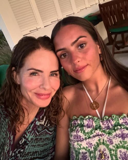 Trinny Woodall and her daughter Lyla smiling.