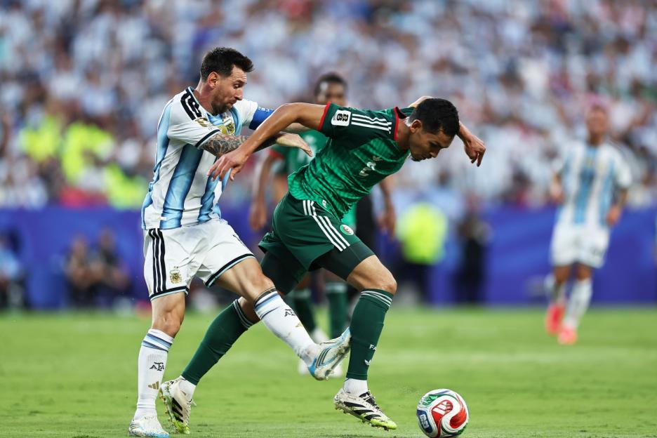 Fans Accuse World Cup of Being 'Rigged' as Lionel Messi Avoids Obvious Red Card for Controversial Challenge on Algeria Star