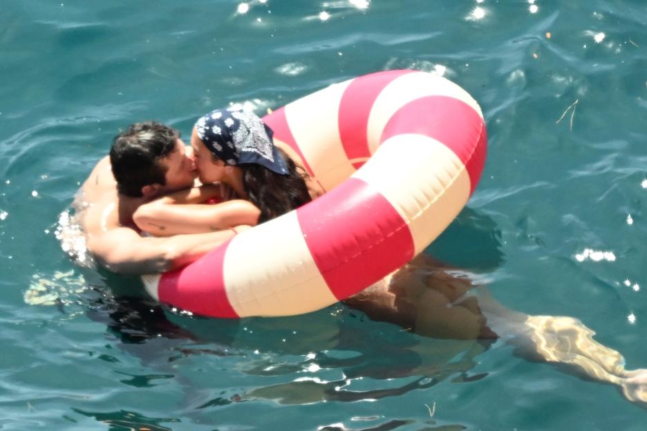 *PREMIUM-EXCLUSIVE* MUST CALL FOR PRICING BEFORE USAGE - Newlyweds Dua Lipa and Callum Turner looked every inch the loved-up couple as they soaked up the sunshine on the stunning Amalfi Coast during their romantic Italian honeymoon.