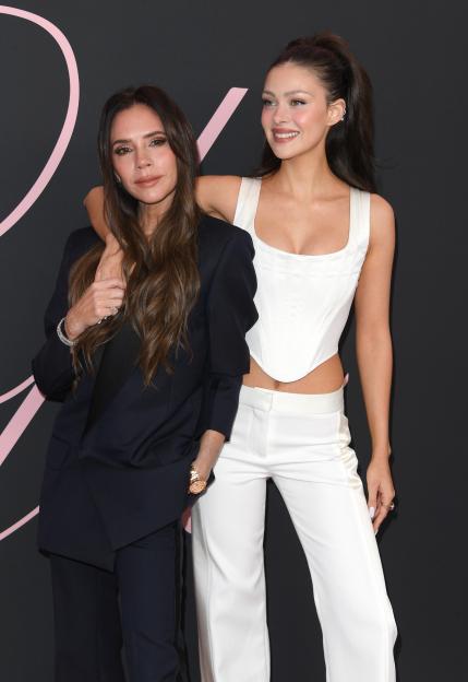 Victoria Beckham and Nicola Peltz Beckham at the premiere of "Lola".