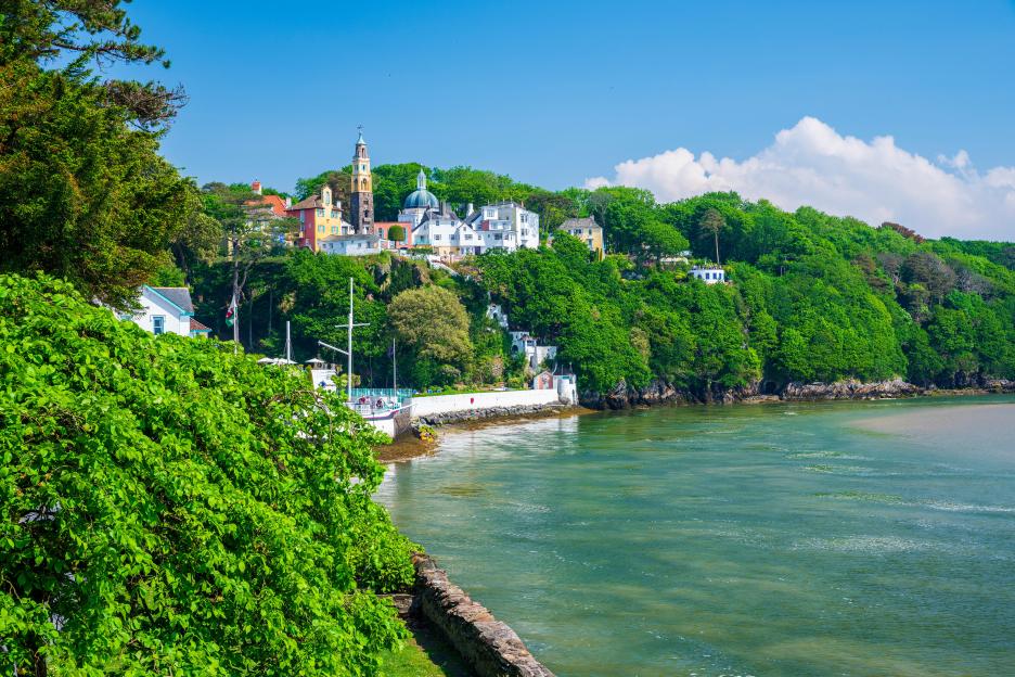 View of Portmeirion village in Wales from across the water.