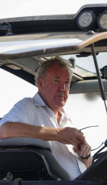 Jeremy Clarkson seated in a vehicle for his farm series.