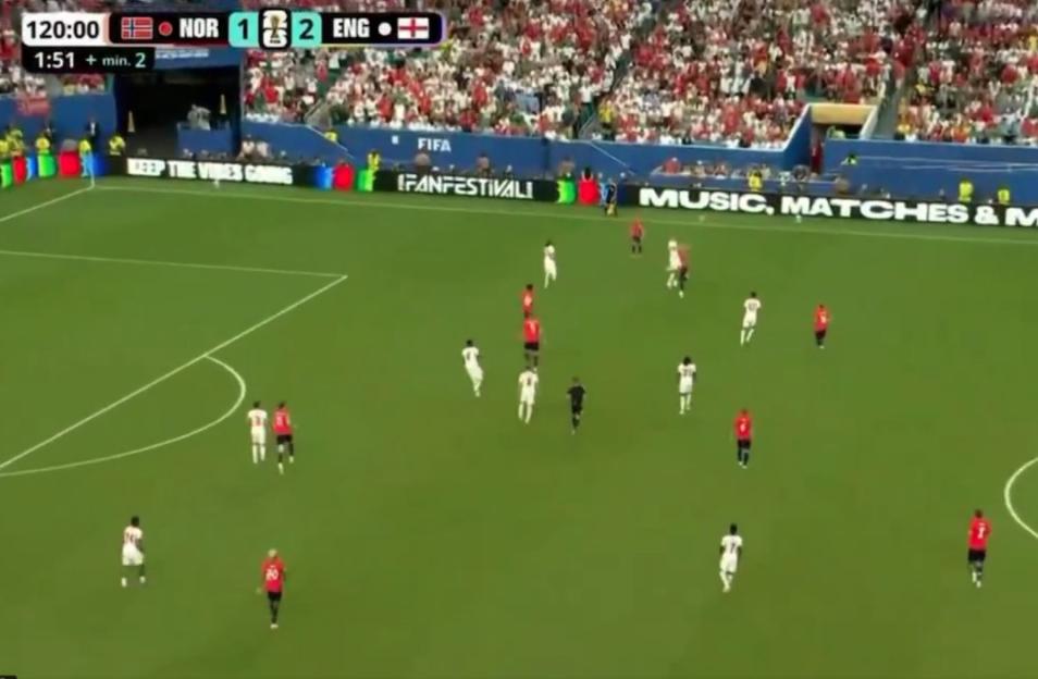 A football match between Norway (NOR) and England (ENG) in which England is leading 2-1 with 1:51 minutes left in the game plus 2 minutes of extra time.