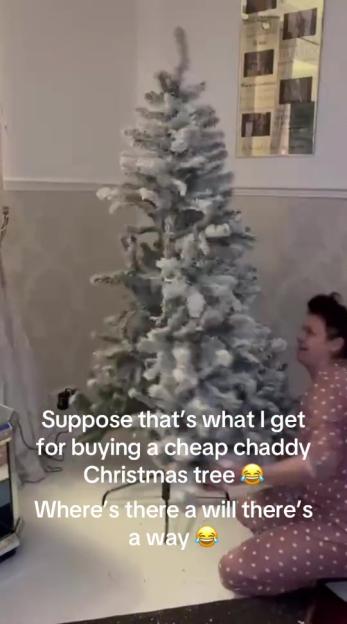 A person decorating a flocked Christmas tree, with text overlays about buying a cheap Christmas tree.