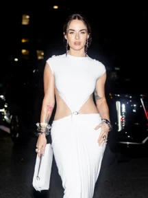 Noughties pop star looks unrecognisable as she flashes toned tum & tattoos at New York Fashion Week – can you guess who?