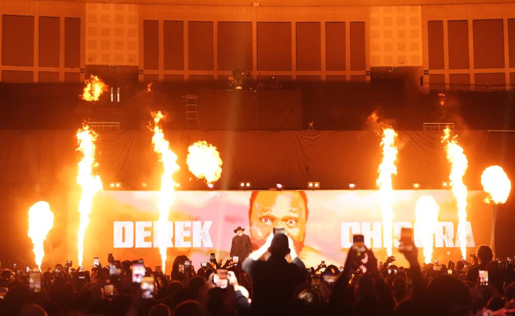 Experience Derek Chisora's Chilling Final Ring Walk as Fans Draw Parallels to WWE Legend Ahead of Deontay Wilder Showdown!