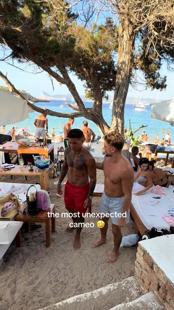 Love Island's Sean Stone and Enzo Fernandez on a beach.