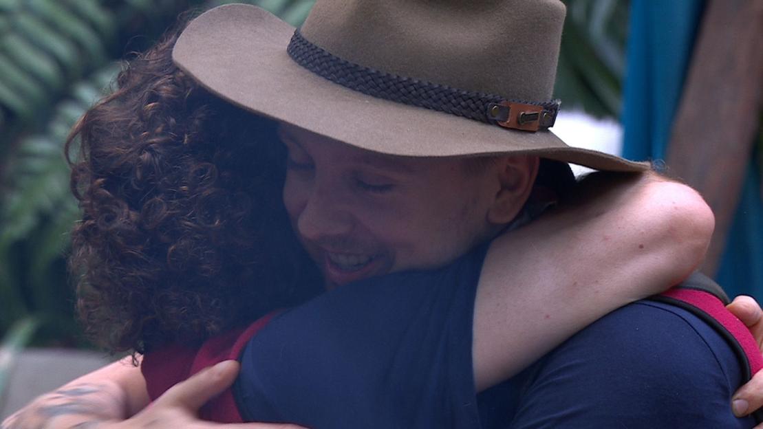 Aitch and Tom Read Wilson hugging.