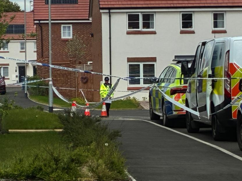 Police tape and officers cordon off a crime scene in Burntwood.