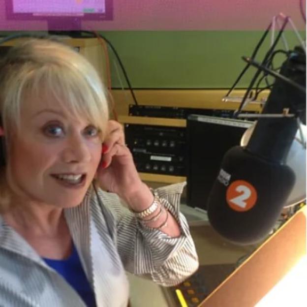 Elaine Paige at a BBC Radio 2 microphone.