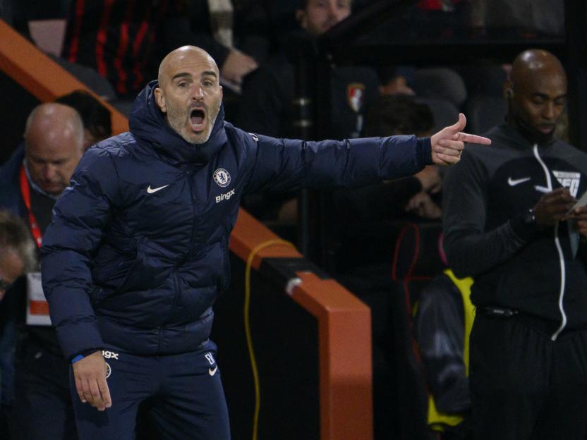 Chelsea manager Enzo Maresca shouting instructions from the technical area during a match.
