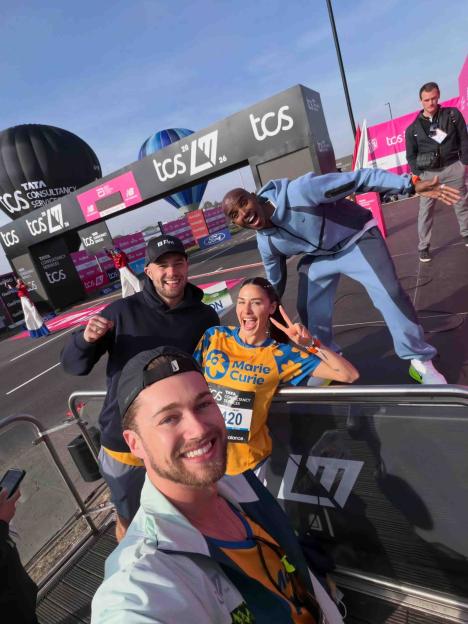 AJ and Curtis Pritchard with Zara Zoffany and Mo Farah posing at the London Marathon.