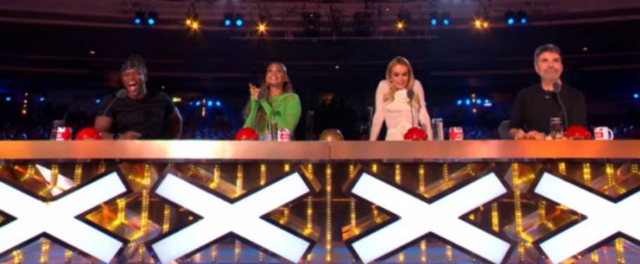Four judges seated at a table on the Britain's Got Talent show.