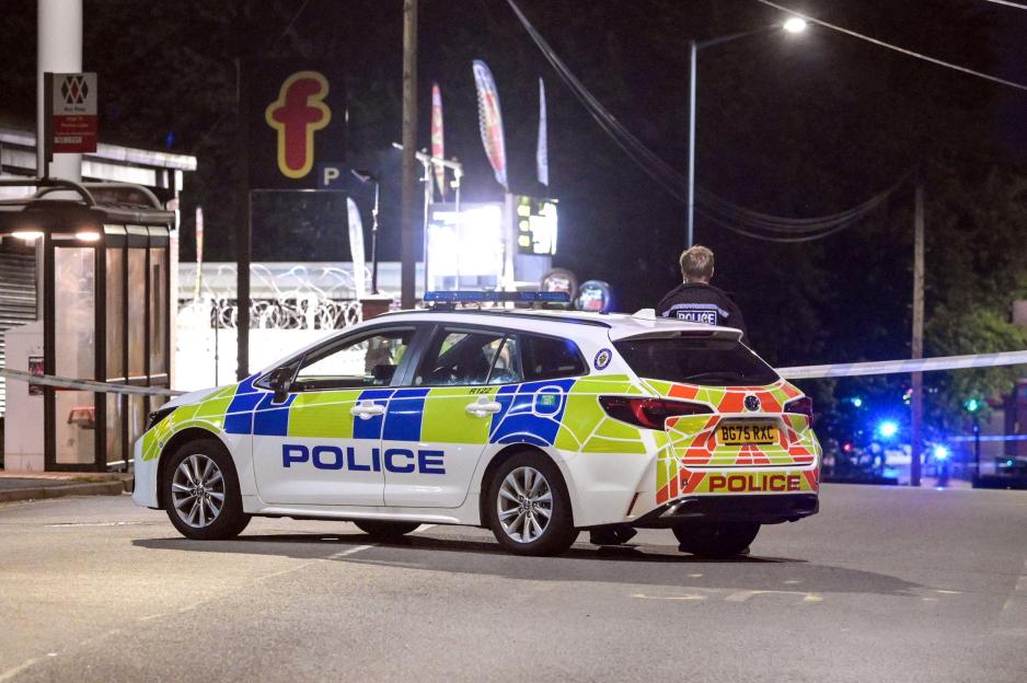 A police car at the scene of a serious road collision in Tipton, West Midlands.