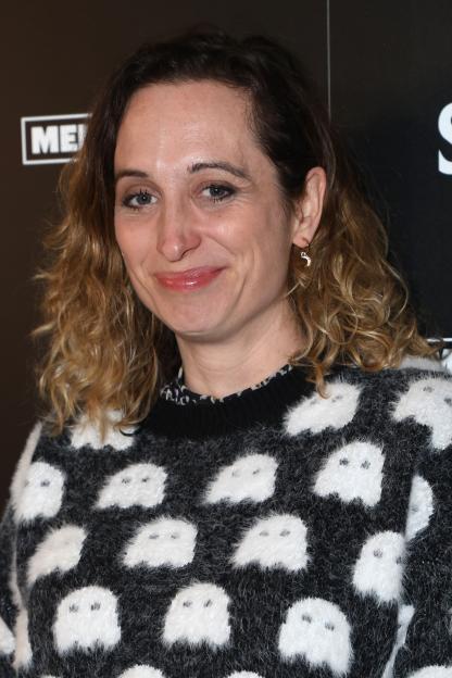 Isy Suttie in a black and white ghost-patterned sweater.
