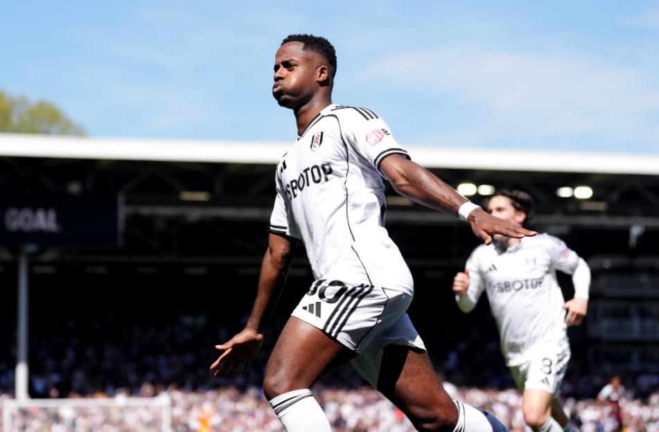 Bobby Decordova-Reid celebrating after scoring a goal for Fulham against Aston Villa at Craven Cottage.