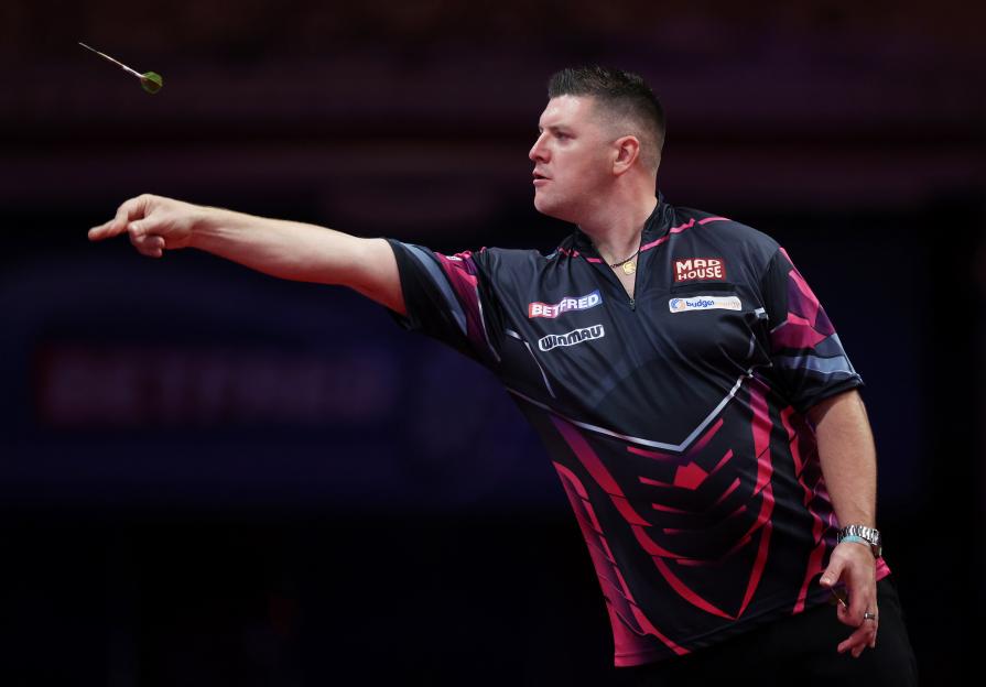 Daryl Gurney of Northern Ireland throws a dart during a match.