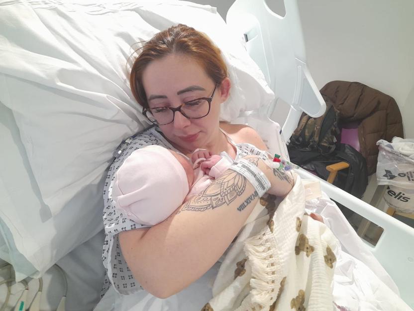 Mum nearly "died" in childbirth after feeling hot as she was being stitched up