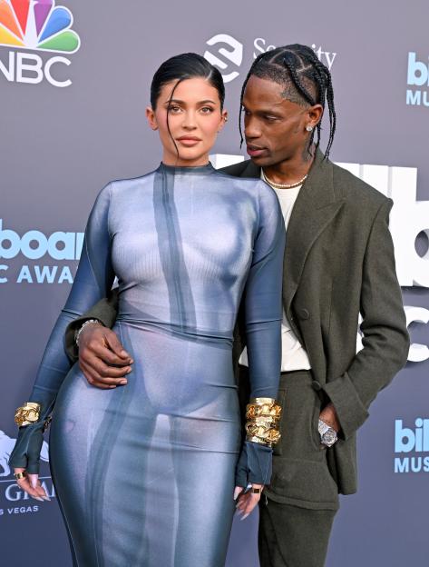 Kylie Jenner and Travis Scott pose on the red carpet of the 2018 Met Gala.