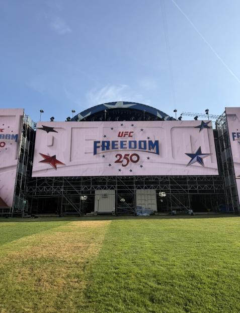 UFC Freedom 250 stage setup under a blue sky.