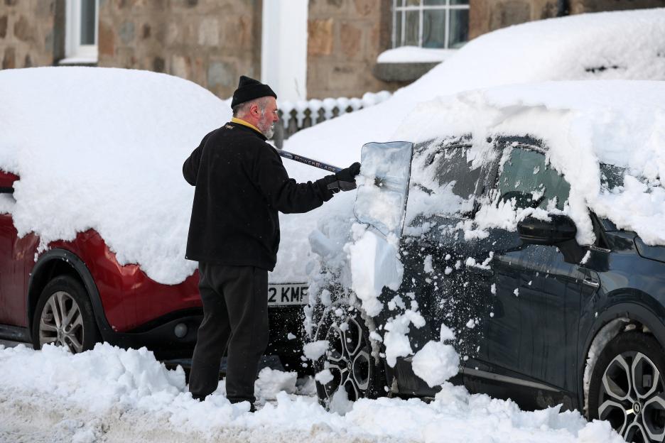 Shoveling snow in Scotland