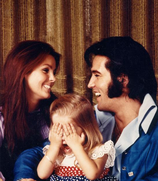 ELVIS PRESLEY with Priscilla and daughter Lisa Marie about 1973