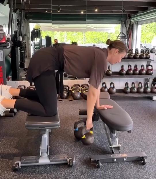 Maria Sharapova training with a kettlebell at the gym.